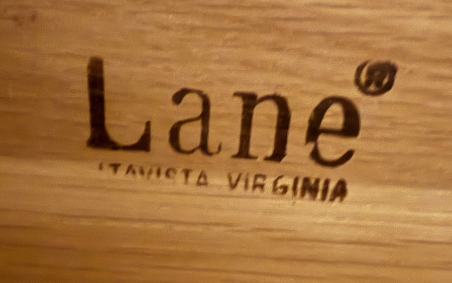 The word Lane in script with a registered trademark symbol, and Altavista Virginia beneath, burned into the inside of a drawer